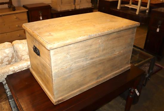 A Victorian stripped pine trunk with internal candlebox, Width 83cm